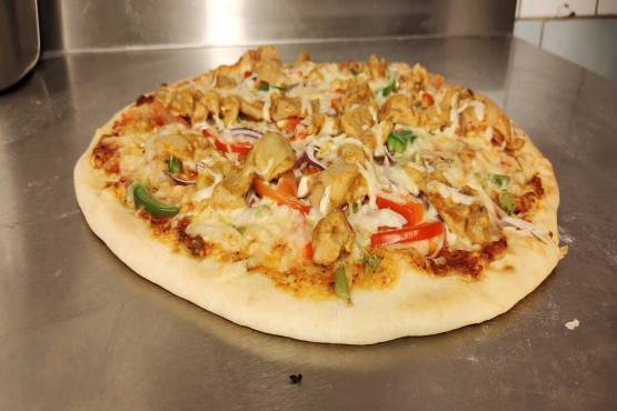 CURRY HOUSE SPECIAL (OPTIONAL PIZZA WITH DRESSING)